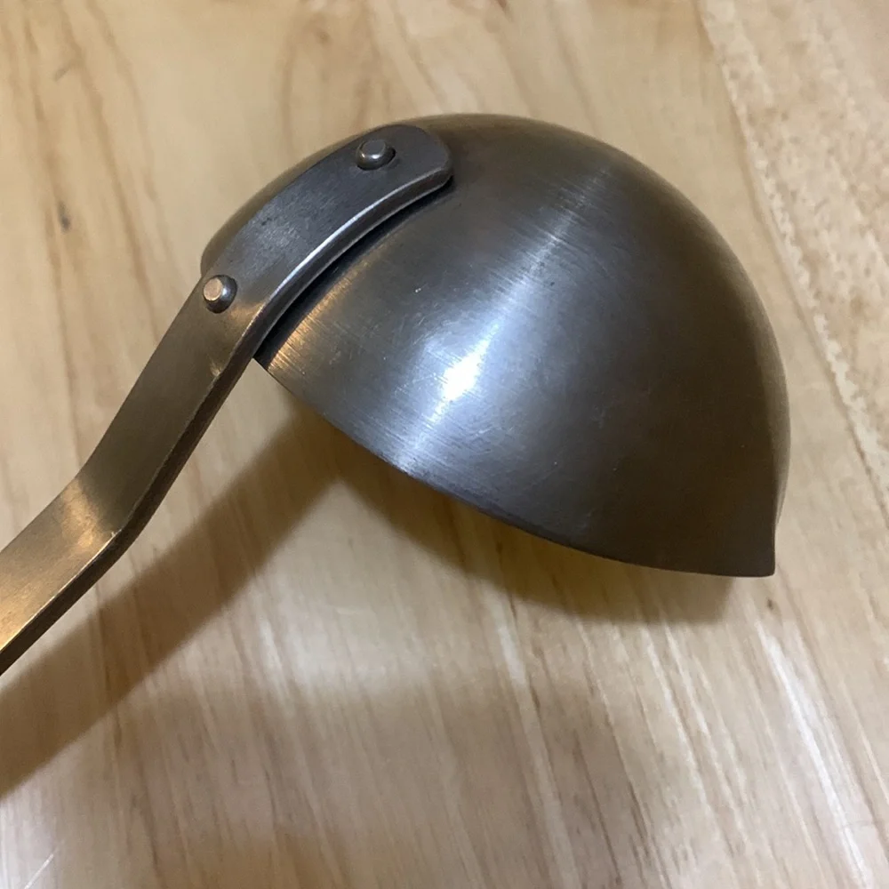 Stainless Steel vintage Ladle with cool sculpted handle
